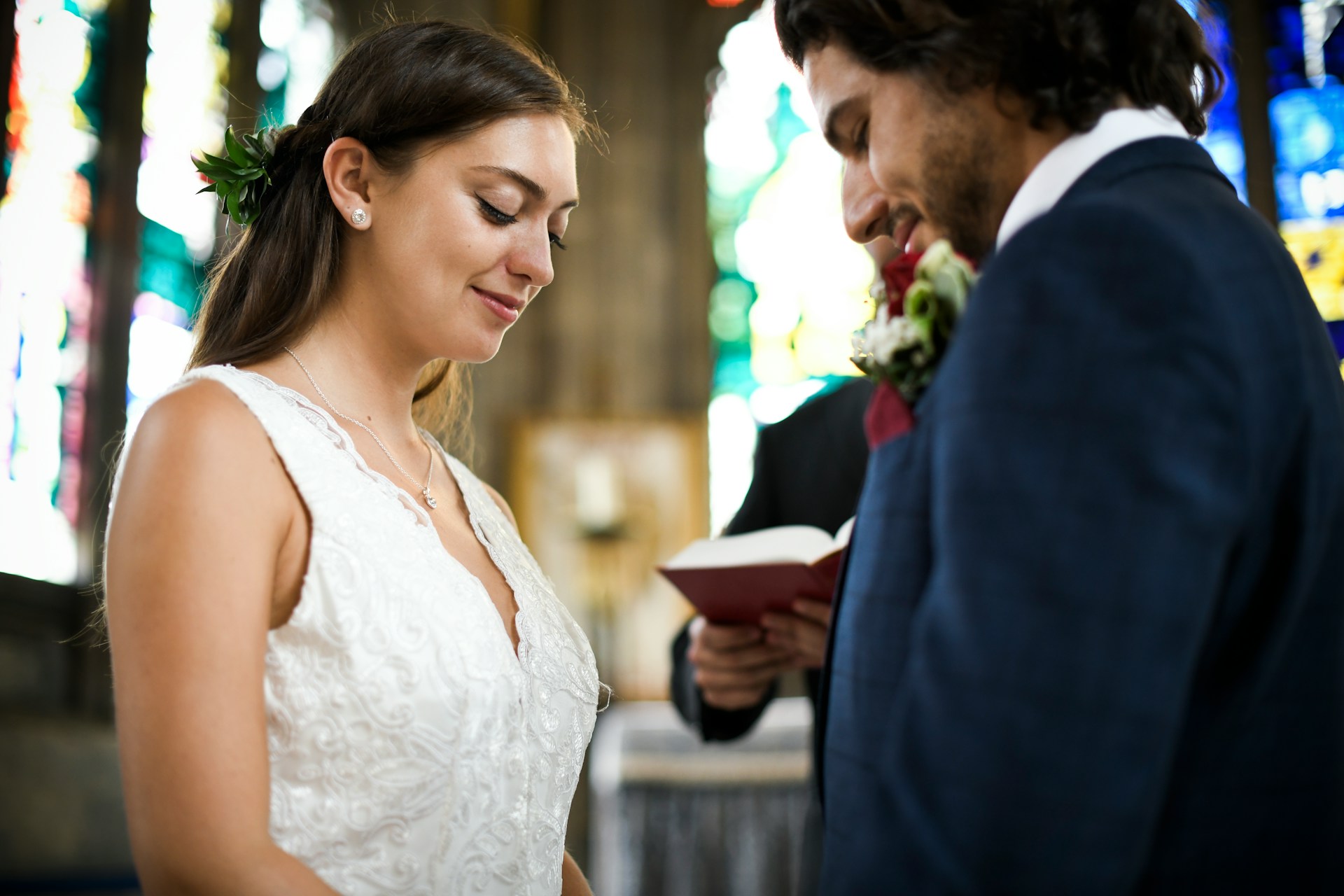 Bride and groom together during their wedding ceremony in a church